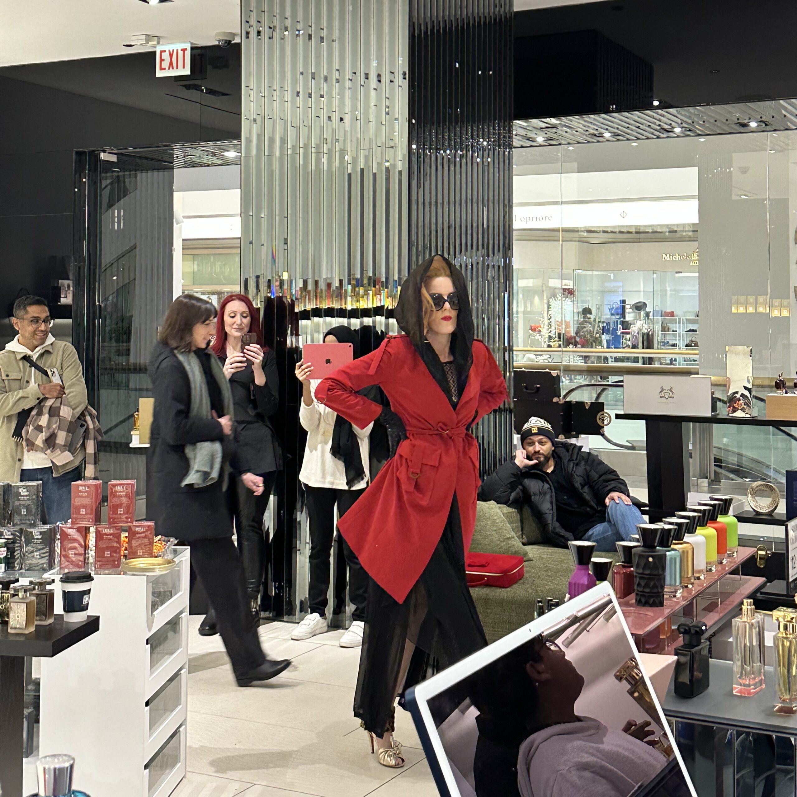 Cinematic immersive performer interacting with guests during luxury retail brand activation