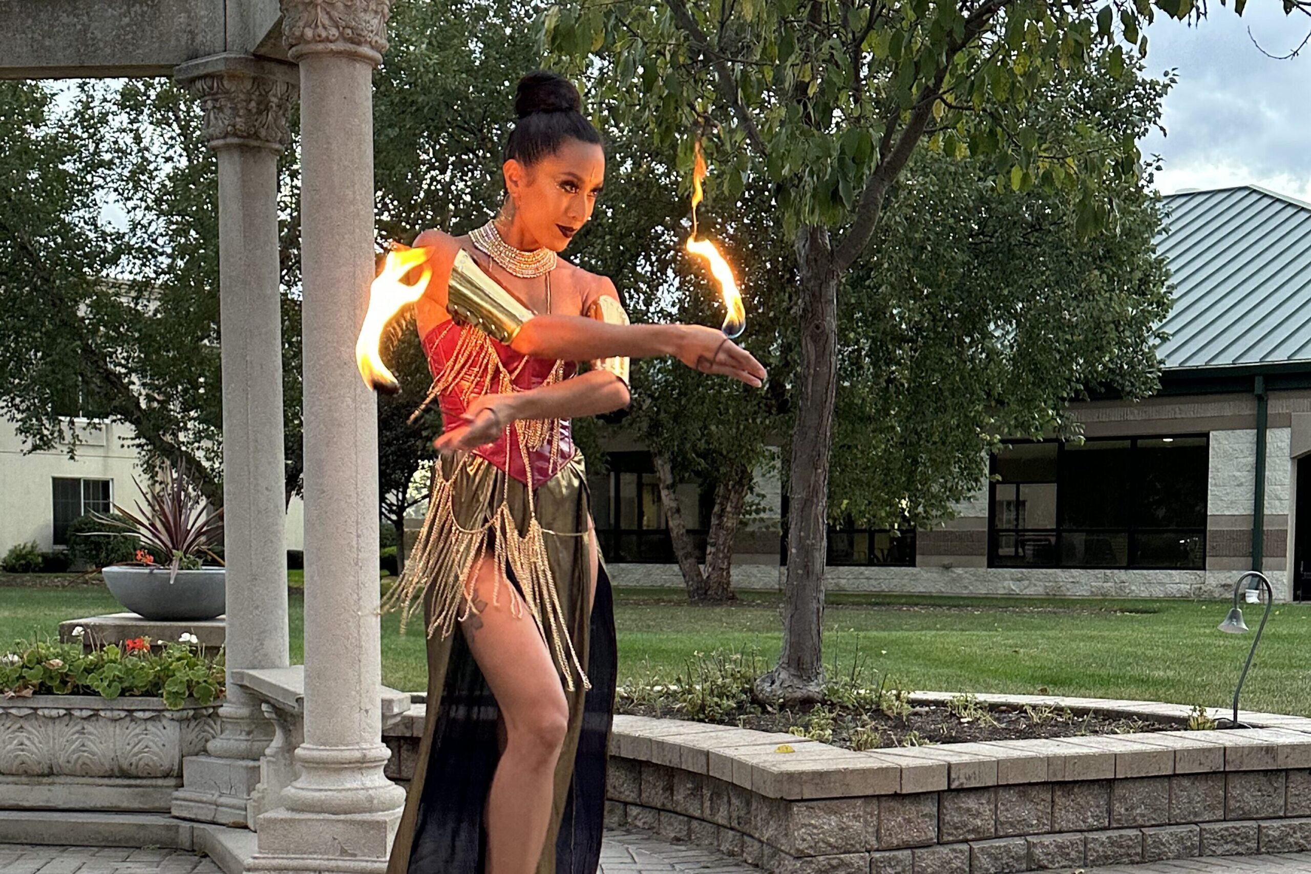 Chicago Fire Performers for Corporate Events | Vaudezilla Vaudezilla Chicago fire performers entertaining guests at a luxury corporate gala with choreographed fire dancing and live fire show