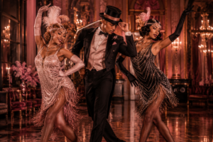Three 1920s dancers performing in an ornate pink Art Deco ballroom