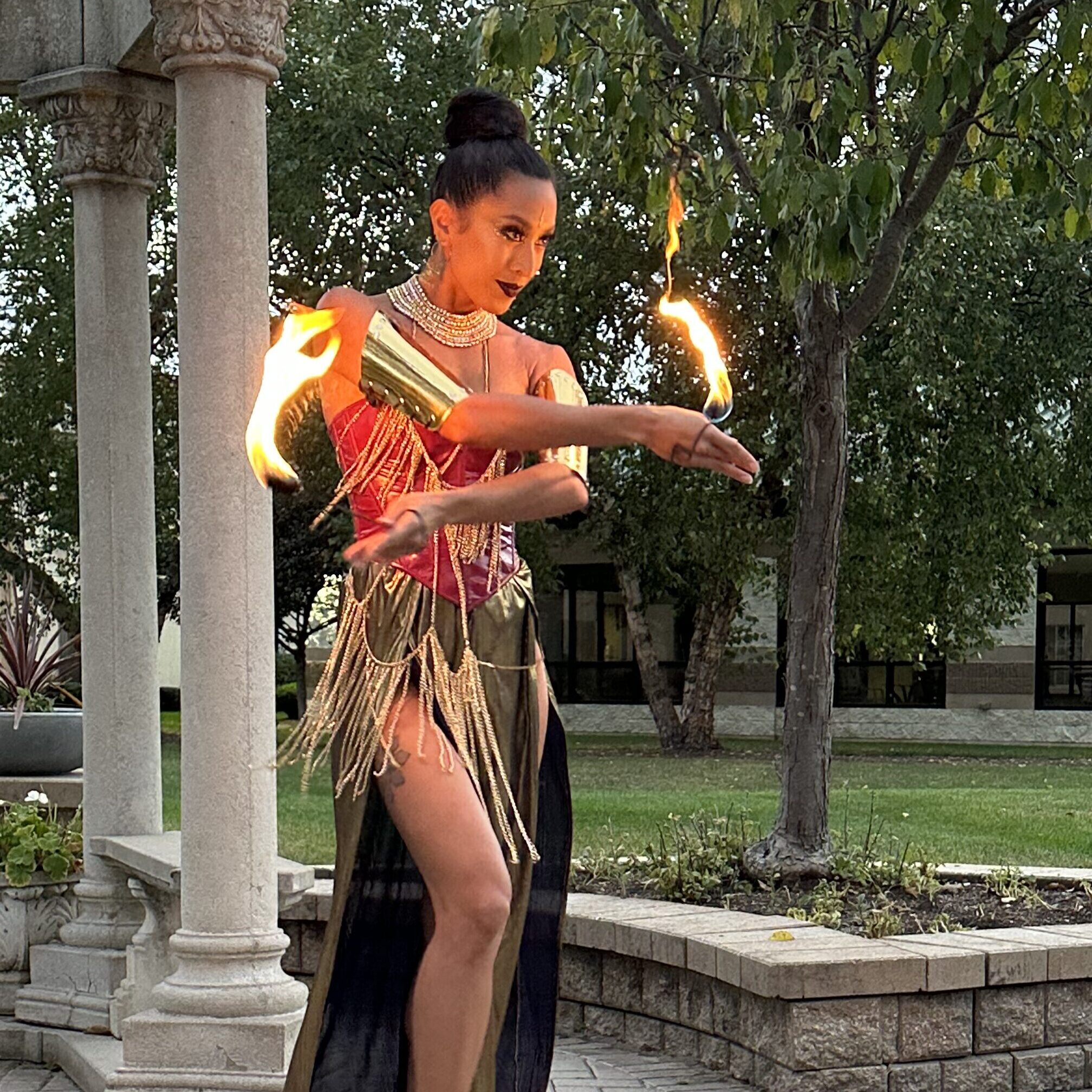 Chicago Fire Performers for Corporate Events | Vaudezilla Vaudezilla Chicago fire performers entertaining guests at a luxury corporate gala with choreographed fire dancing and live fire show